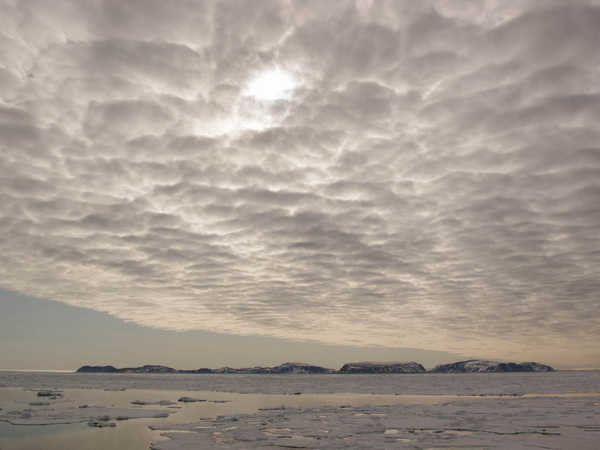 Cielo a pecorelle all'uscita dall'Isfjord